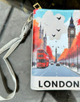 purse with London-themed design featuring Big Ben and a red bus.