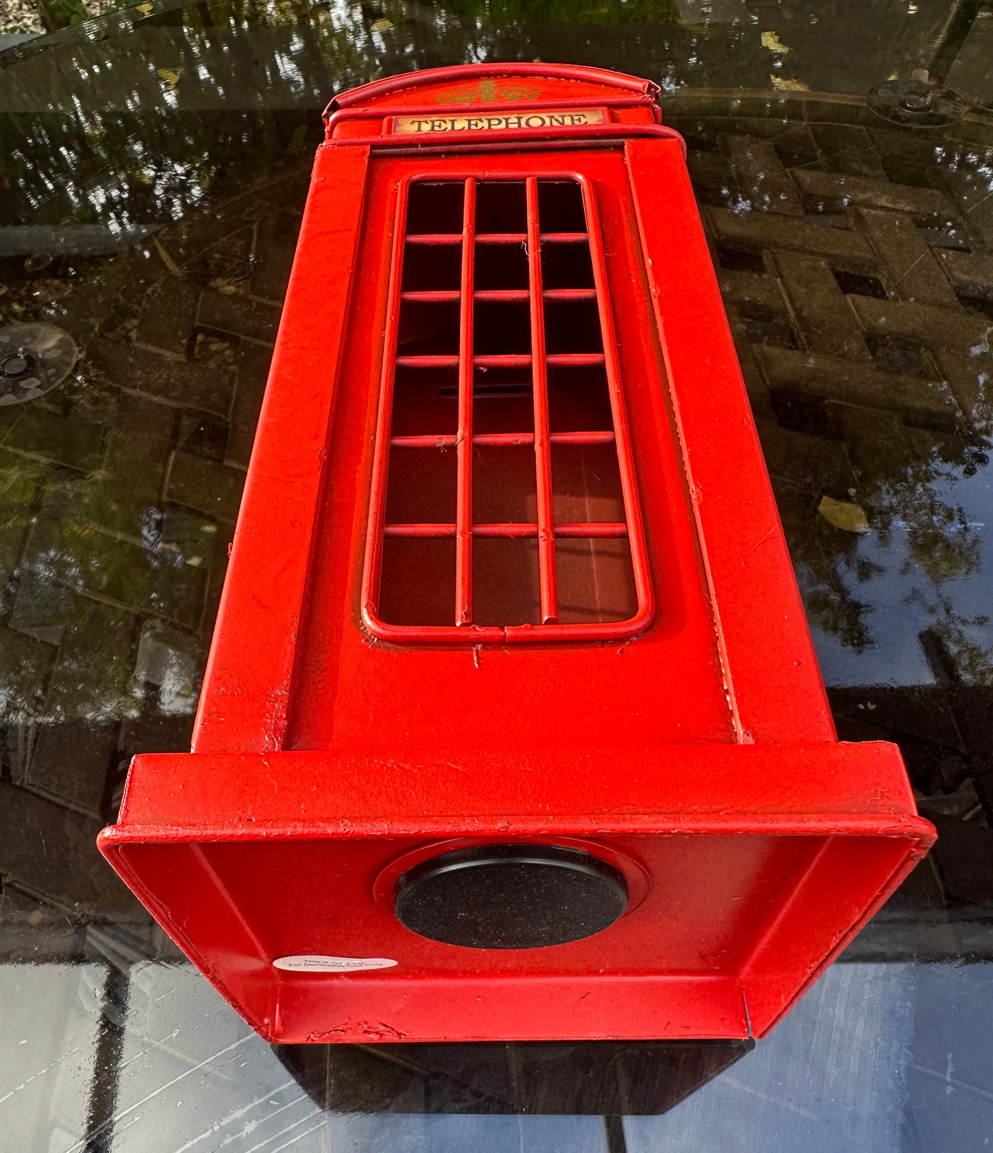 Red model of a British telephone box 